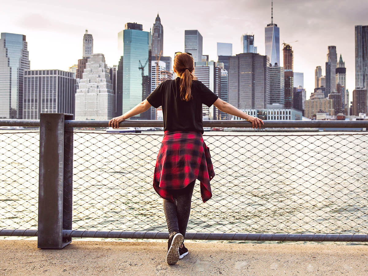 Young Adult Looking at NYC Skyline
